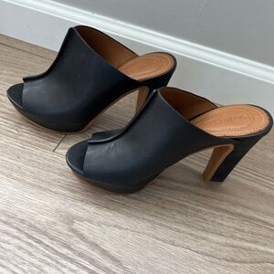 See By Chloe women’s black leather heeled clogs